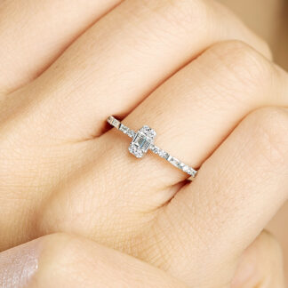 Diamantring aus 585er Gold mit Baguettesteinen und Brillantsteinen.