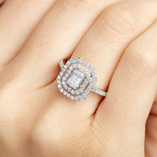 Diamantring aus 585er Gold mit Baguettesteinen und Brillantsteinen.