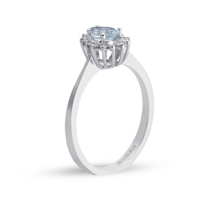 Ring aus Gold mit weißen und blauen Zirkonia.