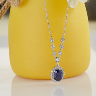 Goldkette mit ovalem blauen und klaren Zirkoniasteinen